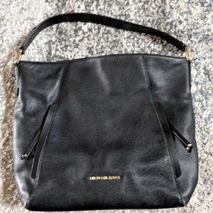 Authentic black leather Michael Kors shoulder/hobo handbag